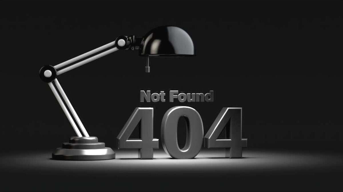 Scritta 3d 404 not found illuminato da una lampada da ufficio